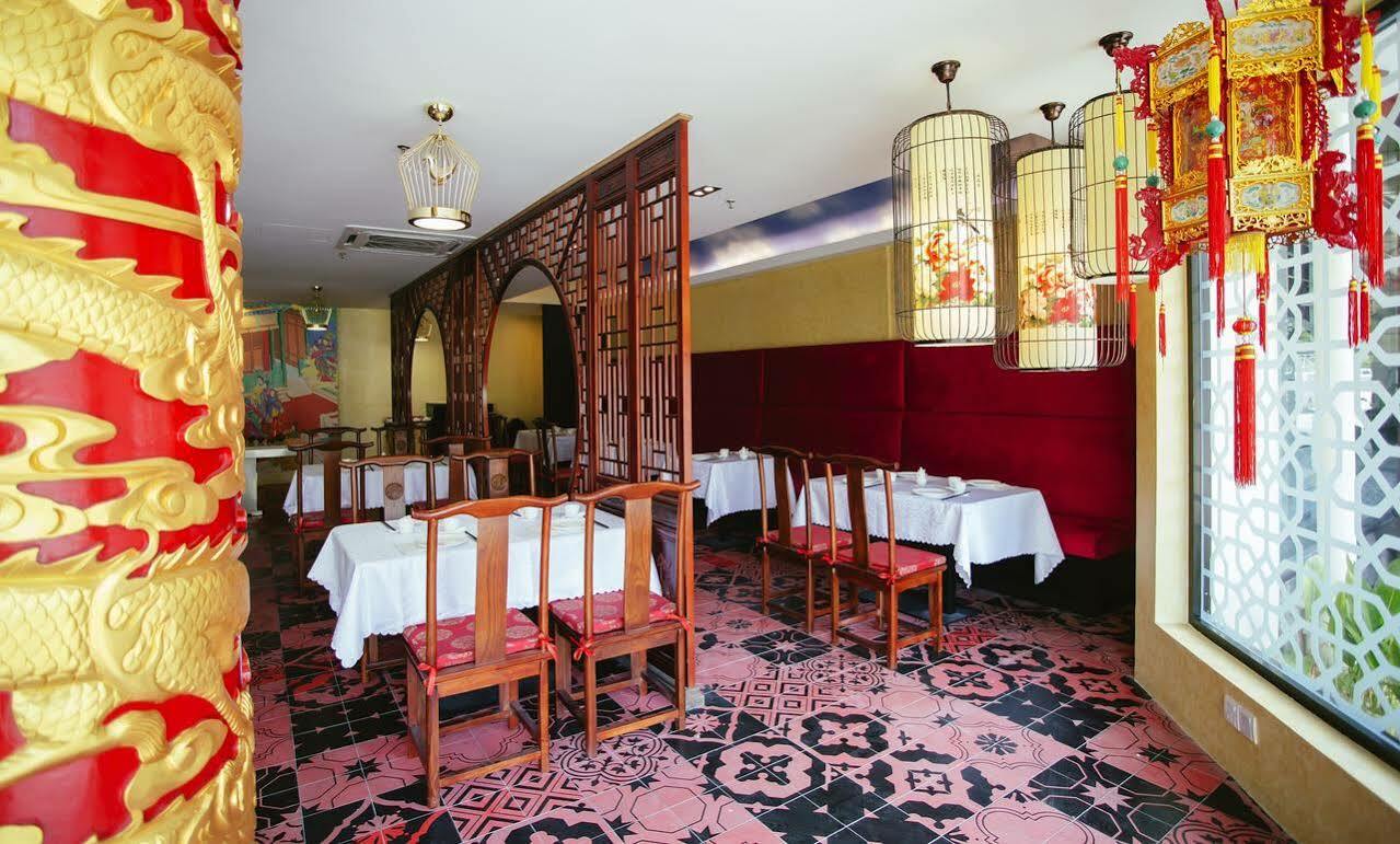 Sand & Sandals Desaru Beach Resort & Spa Dış mekan fotoğraf Interior of a restaurant in Beijing
